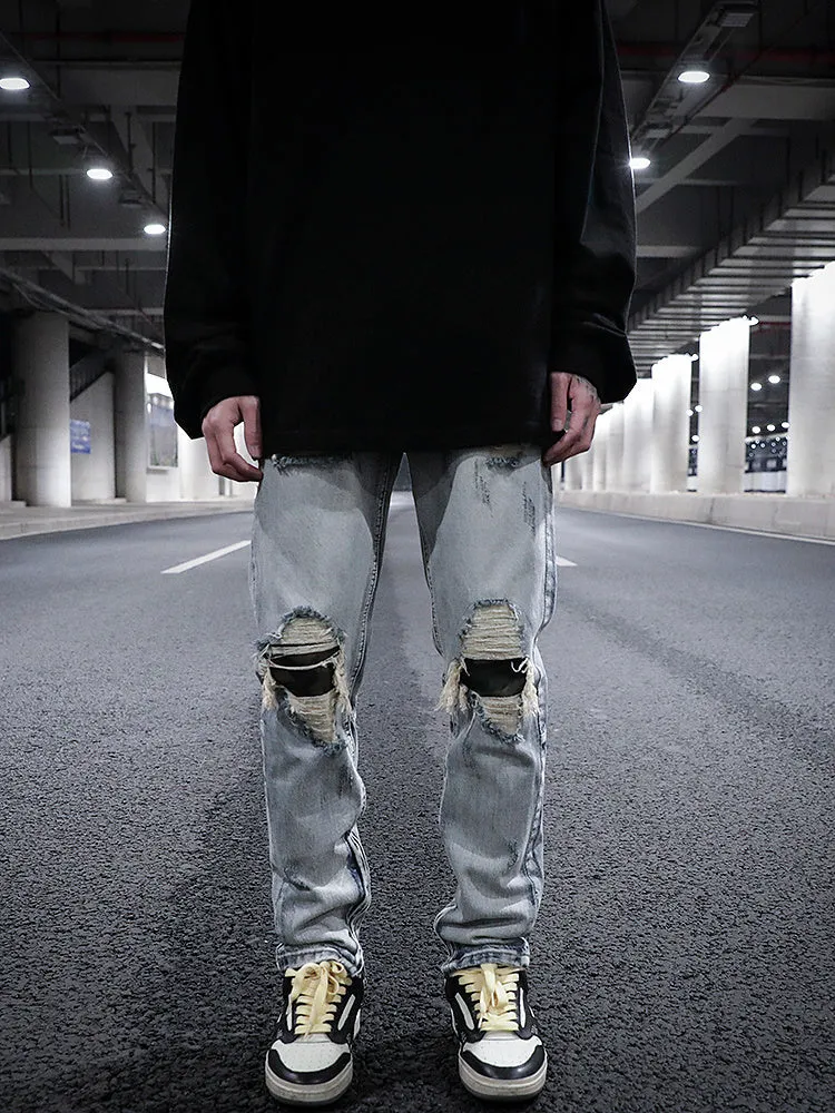 Pantalon Jean délavé à l'eau avec patch camouflage